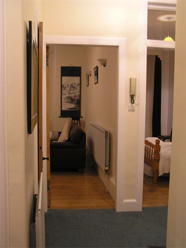 hallway view from back bedroom to front rooms