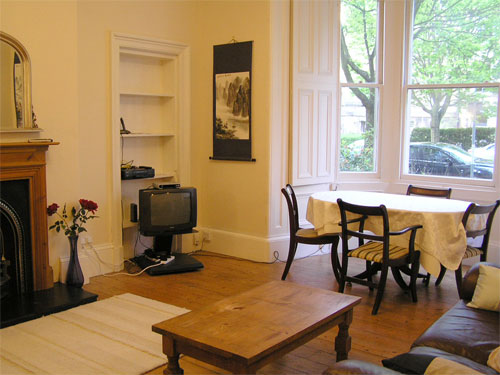 Front living room with view to the leafy residential street, Gladstone Terrace