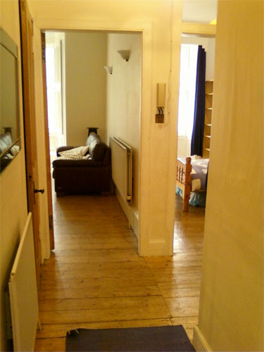 hallway view from back bedroom to front rooms