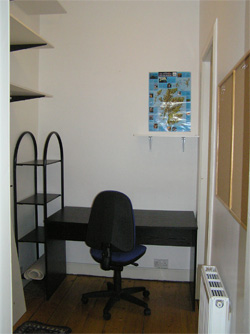 The study with desk, shelving and ergonomic chair; wifi broadband is available